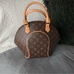 Louis Vuitton Brown and Tan Monogram Satchel. NOT AUTHENTIC